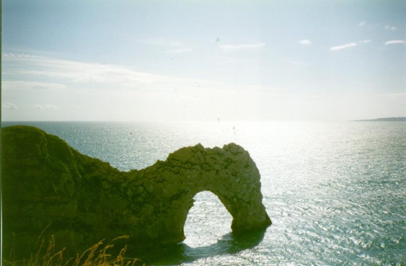 Durdle Dor Limestone Arch over the sea.